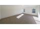 Bright and spacious bedroom with neutral carpeting and large windows at 5470 Crow Dr, Cumming, GA 30041