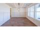 Formal dining room with hardwood floors and decorative molding at 5470 Crow Dr, Cumming, GA 30041