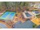 Aerial view showing tennis courts, swimming pool, and playground amenities near the home at 4800 Silverberry Nw Ln, Acworth, GA 30102