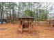 Wooden gazebo in the backyard, ideal for relaxation at 4800 Silverberry Nw Ln, Acworth, GA 30102