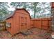 Large storage shed in the backyard with double doors at 4800 Silverberry Nw Ln, Acworth, GA 30102