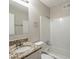 Clean bathroom with granite countertop and shower/tub at 6695 Buckhurst Trl, Atlanta, GA 30349