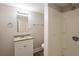 Updated bathroom with granite vanity and shower at 6695 Buckhurst Trl, Atlanta, GA 30349