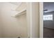 Large walk-in closet with shelving and hanging rod at 6695 Buckhurst Trl, Atlanta, GA 30349