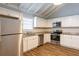 Modern kitchen with granite countertops and stainless steel appliances at 6695 Buckhurst Trl, Atlanta, GA 30349