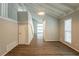 Spacious living area with high ceilings and wood flooring at 6695 Buckhurst Trl, Atlanta, GA 30349