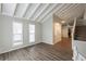 Open living room with high ceilings and wood flooring at 6695 Buckhurst Trl, Atlanta, GA 30349
