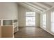 Living room with vaulted ceiling and wood flooring at 6695 Buckhurst Trl, Atlanta, GA 30349