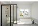 Bathroom with soaking tub and walk-in shower at 5435 Crestline View Rd, Cumming, GA 30028