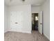 Spacious bedroom with double door closet and access to hallway at 5435 Crestline View Rd, Cumming, GA 30028