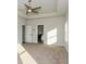 Spacious bedroom with carpeted floor and ceiling fan at 5435 Crestline View Rd, Cumming, GA 30028