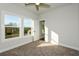 Bright bedroom with large window and door to hallway at 5435 Crestline View Rd, Cumming, GA 30028
