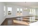 Bright dining room with hardwood floors and access to a deck at 5435 Crestline View Rd, Cumming, GA 30028