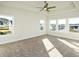 Large main bedroom with carpeted floors and abundant natural light at 5435 Crestline View Rd, Cumming, GA 30028