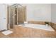 Bathroom includes tile shower and large soaking tub at 570 Parkside Village Nw Way # 12, Marietta, GA 30060