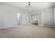 Spacious bedroom with plush carpeting and white trim, offering a cozy retreat at 570 Parkside Village Nw Way # 12, Marietta, GA 30060