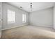 Bright, carpeted bedroom featuring white walls and ample natural light at 570 Parkside Village Nw Way # 12, Marietta, GA 30060