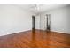Bright bedroom with hardwood floors, ceiling fan and neutral paint at 570 Parkside Village Nw Way # 12, Marietta, GA 30060