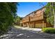 Rear exterior view of townhomes with private decks and garages at 570 Parkside Village Nw Way # 12, Marietta, GA 30060