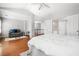 Main bedroom includes sitting area, neutral walls, and wood flooring at 570 Parkside Village Nw Way # 12, Marietta, GA 30060