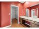 Main bathroom with walk-in closet and vanity area at 7825 Brands Hatch Blvd, Cumming, GA 30040