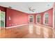 Spacious bedroom with hardwood floors and large windows at 7825 Brands Hatch Blvd, Cumming, GA 30040