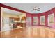 Breakfast room with hardwood floors and access to back deck and yard at 7825 Brands Hatch Blvd, Cumming, GA 30040
