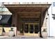 Ornate building entrance with grand bronze doors and canopy at 32 Peachtree St # 403, Atlanta, GA 30303