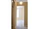 Light-filled hallway with light brown walls and wood-look flooring at 32 Peachtree St # 403, Atlanta, GA 30303