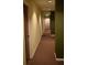 Building hallway with carpeted floor and neutral walls at 32 Peachtree St # 403, Atlanta, GA 30303