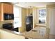 Galley kitchen with granite countertops and appliances at 32 Peachtree St # 403, Atlanta, GA 30303