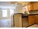 Open concept kitchen with breakfast bar and stainless steel appliances at 32 Peachtree St # 403, Atlanta, GA 30303