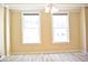 Spacious living room with large windows and hardwood floors at 32 Peachtree St # 403, Atlanta, GA 30303