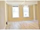 Bright living room with hardwood floors and large windows at 32 Peachtree St # 403, Atlanta, GA 30303
