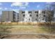 Modern building exterior with parking and green space at 456 Parkway Ne Dr # 12, Atlanta, GA 30308