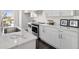 Modern kitchen with white cabinets, stainless steel appliances, and marble countertops at 456 Parkway Ne Dr # 12, Atlanta, GA 30308
