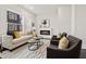 Living Room with electric fireplace, comfortable seating, and large windows at 456 Parkway Ne Dr # 12, Atlanta, GA 30308