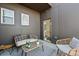 Private patio with wicker furniture and city view at 456 Parkway Ne Dr # 12, Atlanta, GA 30308