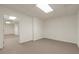 Empty basement room with access to hallway and other rooms at 9635 Haverhill Ln, Johns Creek, GA 30022