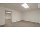 Empty basement room with door to another area at 9635 Haverhill Ln, Johns Creek, GA 30022