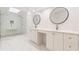 Spa-like bathroom featuring a walk-in shower and double vanity at 9635 Haverhill Ln, Johns Creek, GA 30022