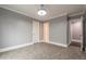 Well-lit bedroom with private bathroom access at 9635 Haverhill Ln, Johns Creek, GA 30022