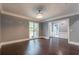 Spacious dining room with hardwood floors and access to entryway at 9635 Haverhill Ln, Johns Creek, GA 30022