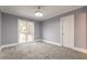 Bright office space with large window and neutral decor at 9635 Haverhill Ln, Johns Creek, GA 30022