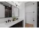 Modern bathroom with double vanity, walk-in shower, and large mirror at 960 Bibbs Nw Cir # 2, Atlanta, GA 30318