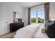 Bright bedroom with large windows and a comfortable bed at 960 Bibbs Nw Cir # 2, Atlanta, GA 30318