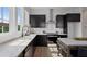 Modern kitchen with dark cabinetry and quartz countertops at 960 Bibbs Nw Cir # 2, Atlanta, GA 30318