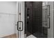 Elegant shower with dark tile and glass enclosure at 960 Bibbs Nw Cir # 2, Atlanta, GA 30318