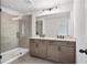 Bathroom with double vanity and glass enclosed shower at 711 Smokey Quartz Way, Kennesaw, GA 30144