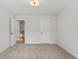 Bedroom with carpet, closet, and light fixture at 711 Smokey Quartz Way, Kennesaw, GA 30144